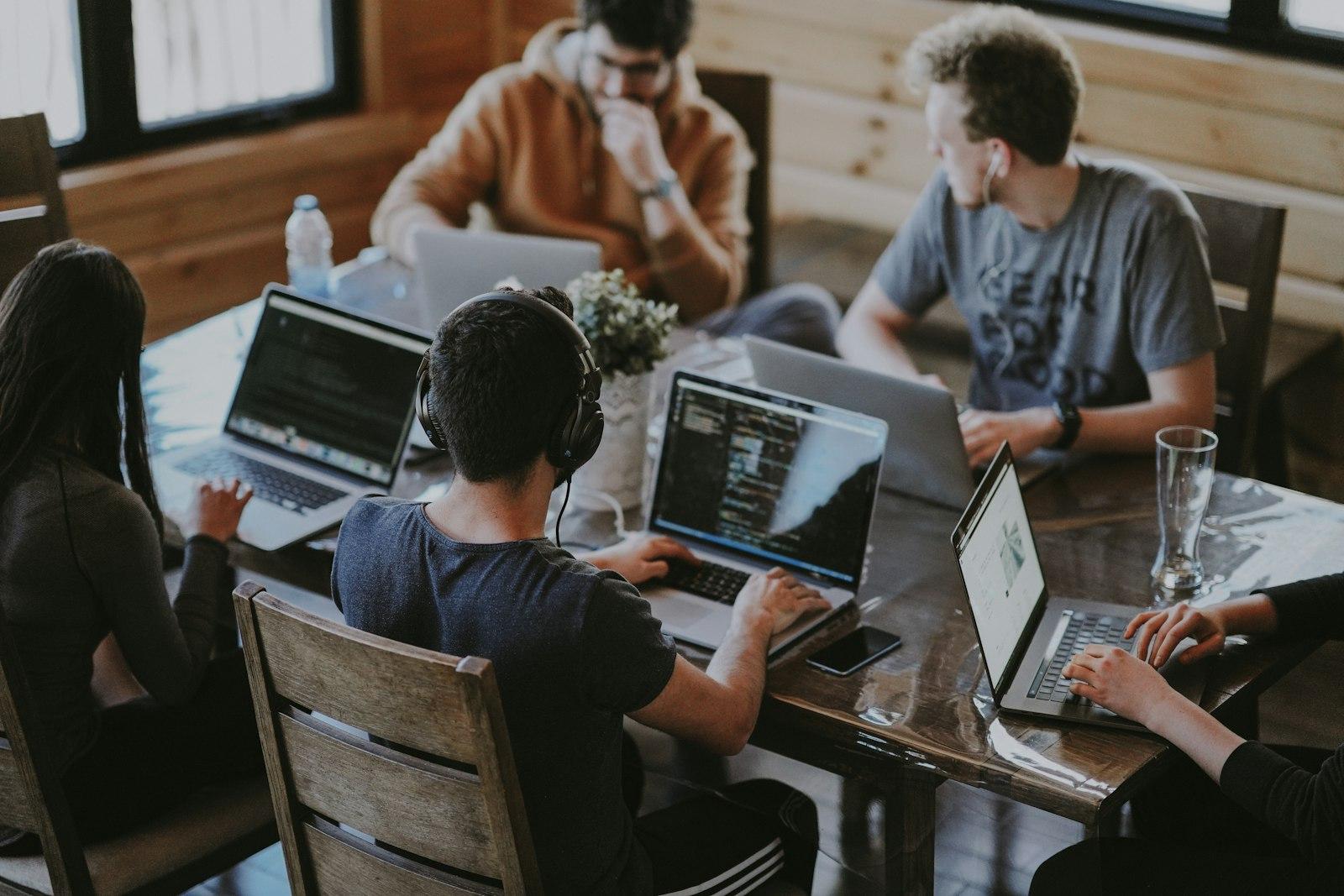 A small team working together around one table
